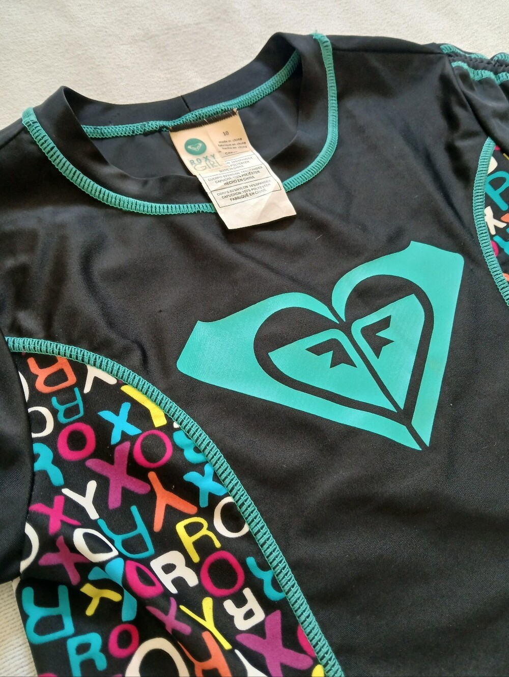 Roxy Girls 10 Black Rashguard Swim Top with Teal Logo and Multicolor Side Panels - Picture 4 of 4